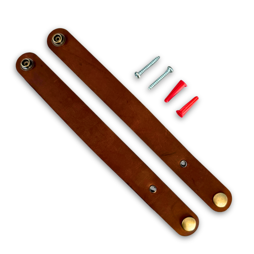 Two brown leather straps with metal eyelets and screws on a white background